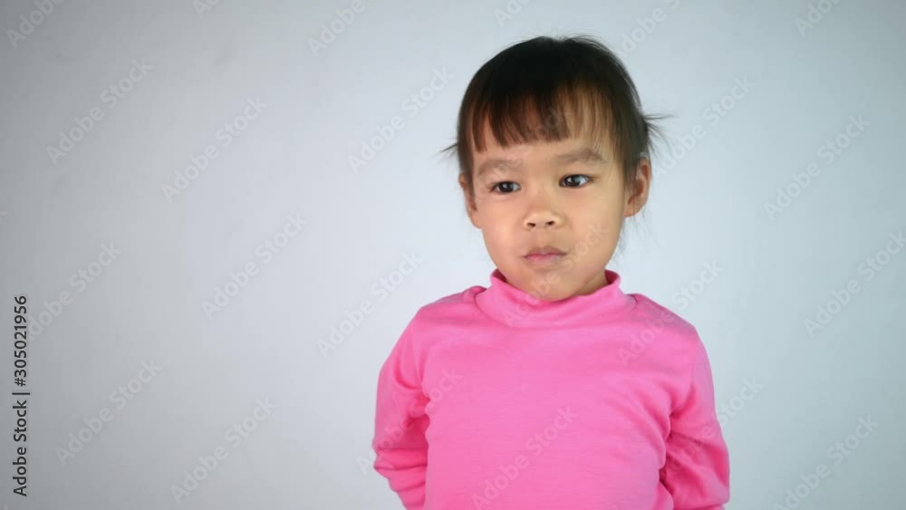Portrait of a happy smiling Asian child girl isolated on white background. Portrait of a happy smiling Asian child girl isolated on white background.