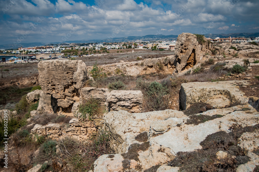 Fototapeta premium The rocks and former quarries of ancient Paphos are very similar to the foundations of the walls, towers, ditches and counterscarps of medieval fortifications. Is that so? Riddle. 