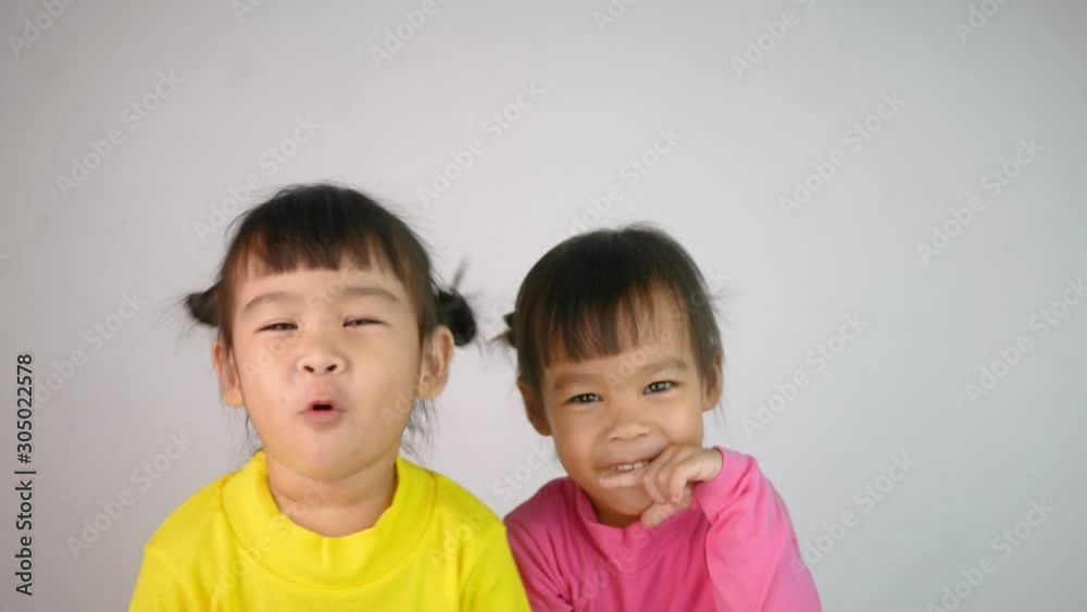 Portrait of a happy smiling Asian child girl isolated on white background. Portrait of a happy smiling Asian child girl isolated on white background.