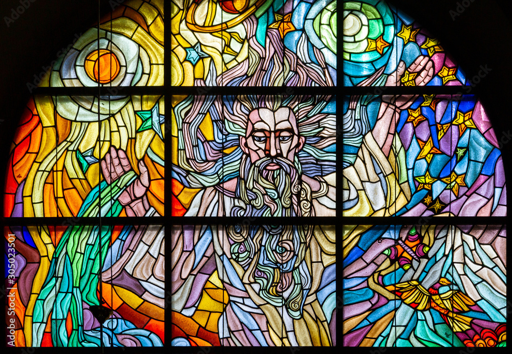 Zegiestow Poland 19 8 10 Stained Glass Window Depicting The Creation Of The World With The Words And God Said Let Us Make Roman Catholic Church Of Saint Anne Stock Photo Adobe Stock