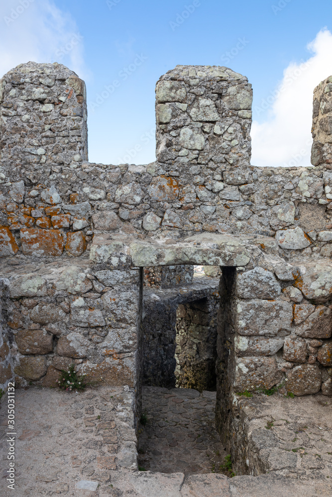 Architectural details from the crenelated stone fortress wall of a
