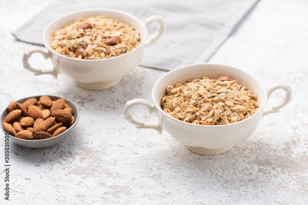 Granola, oatmeal with almond food background Granola, oatmeal with almond food background