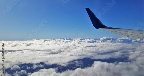 landscape above the clouds from airplane
