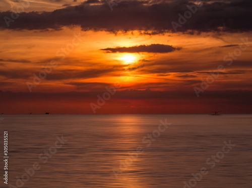 Beautiful sunset over the sea © sikarin