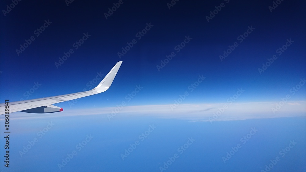 Blue flight, aircraft wing, blue sky Blue flight, aircraft wing, blue sky