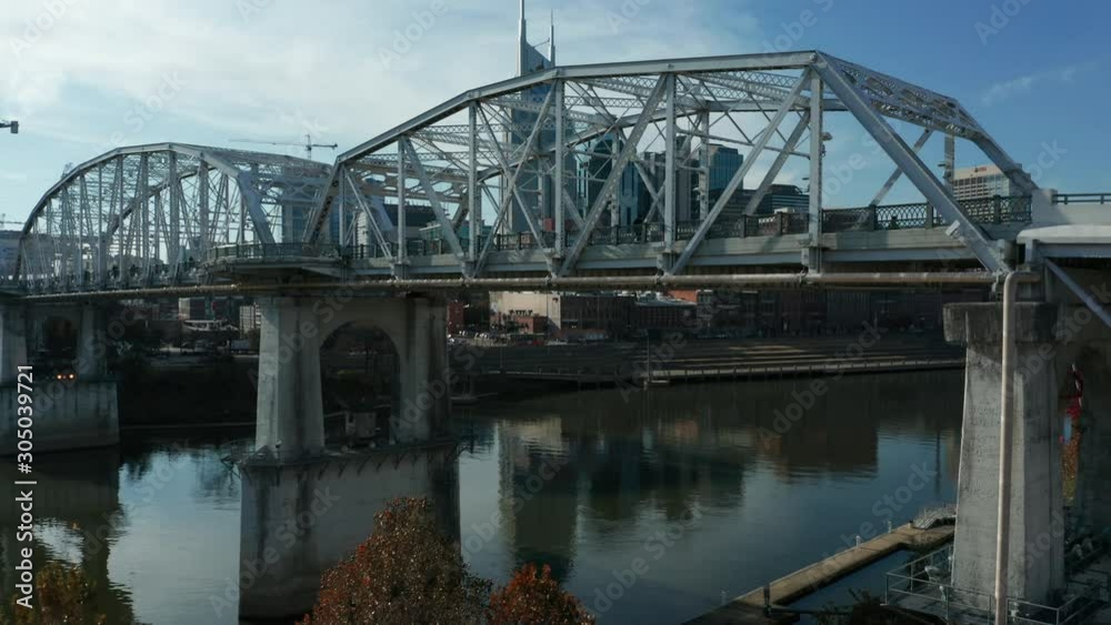 day rising over pedestrian bridge to reveal Nashville skyline day rising over pedestrian bridge to reveal Nashville skyline