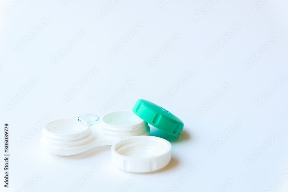 Close up shot of contact lenses container open ready to pick up and wear. Good and convenient solution to improve eye visual better eyesight more comfort. No need to wear glasses.