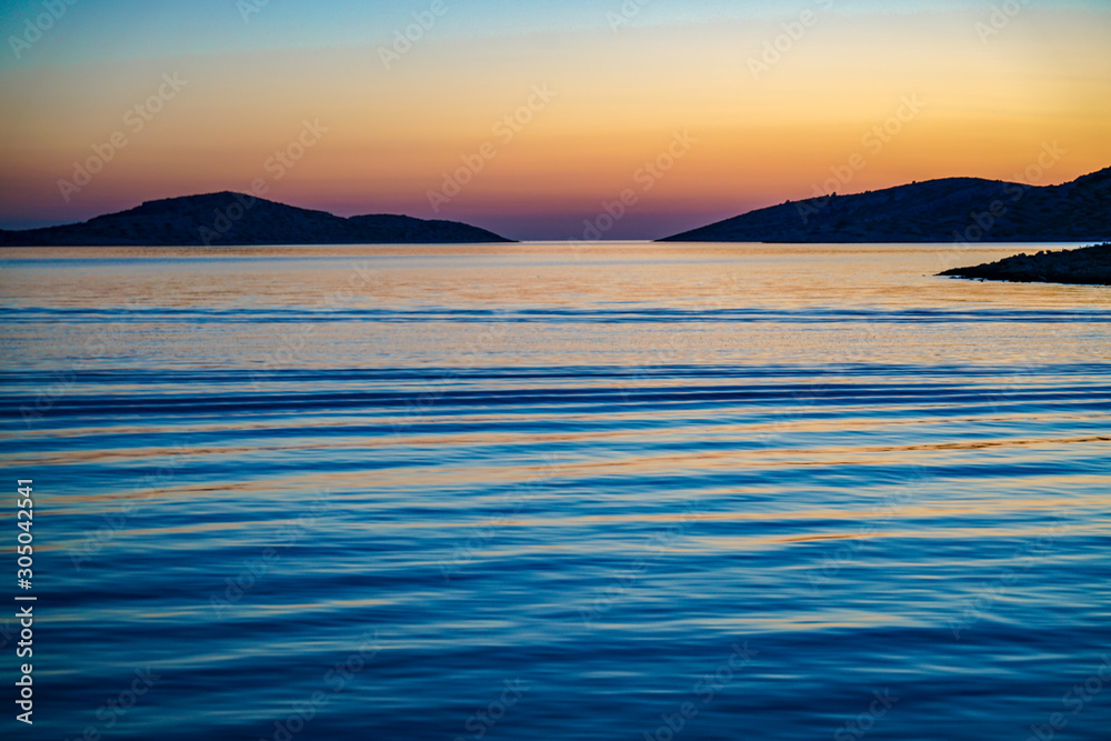 Fototapeta premium Tramonto in mare visto dal catamarano