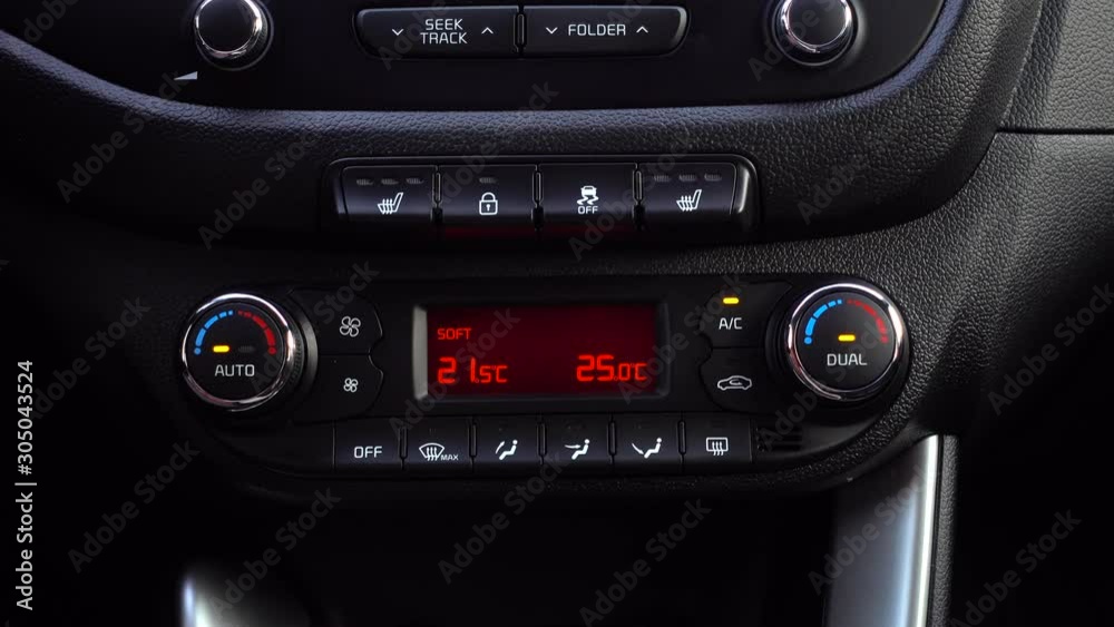 Car Climate Control Adjusting The Temperature. Man pressed finger button AC. Car Climate Control Adjusting The Temperature. Man pressed finger button AC.