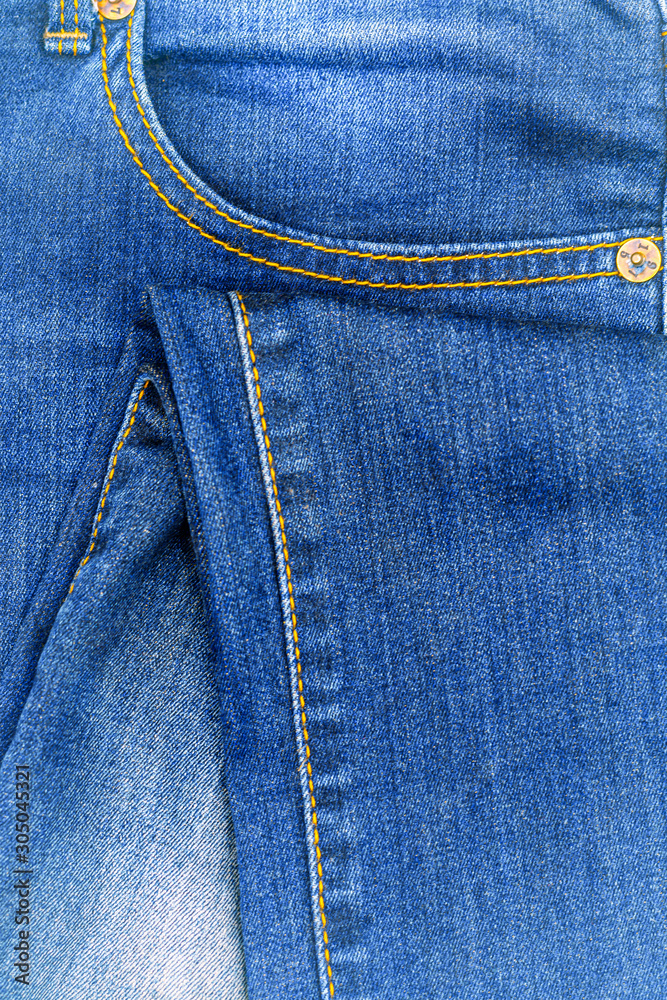 Perspective and closeup view to abstract space of empty light blue natural clean denim texture for the traditional business background in cold bright colors . Perspective and closeup view to abstract space of empty light blue natural clean denim texture for the traditional business background in cold bright colors .