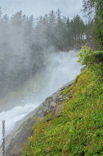 Spray floating through the air at the Krimml Waterfalls seen from the Regen Kanzel on the path to the upper part of the waterfall