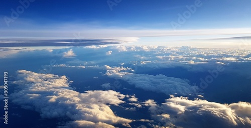 landscape above the clouds seen from the plane © sebi_2569