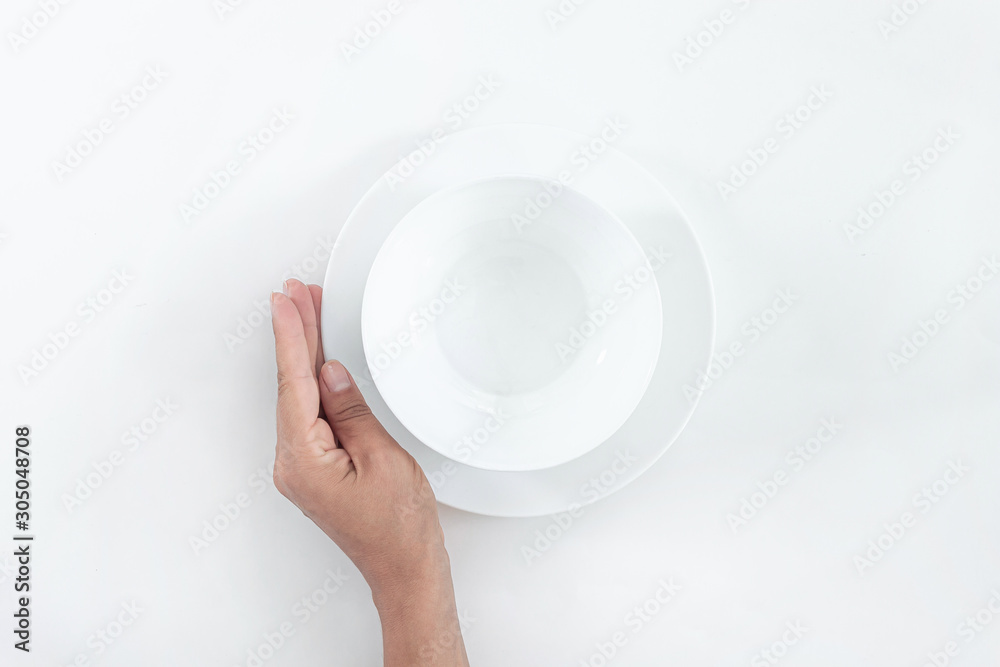 Empty plate on dark stone background. Empty plate on dark stone background.