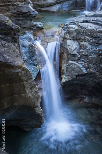 Long exposure of Gavagliasch water fall of imposing Cavagliasco gorge close to giants’ pots site in Val Poschiavo