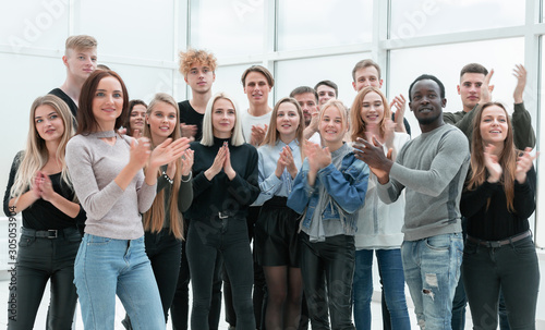 Obraz na plátně group of young people applauding . photo with copy space.