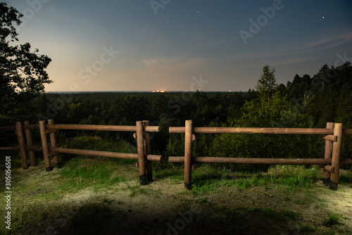 wooden fence at night