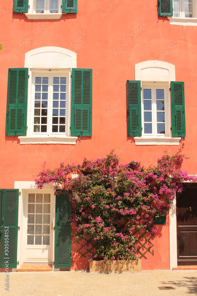 Traditional houses with colorful facades and wooden window shutters in the historic center of Martigues, the Little Venice of Provence, France 