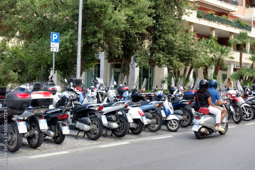 Line of scooters on the street in Sorento