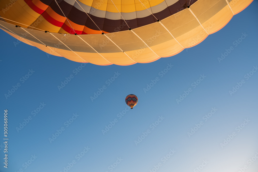 Fototapeta premium View from hot air balloon on another balloon during flight. Cappadocia, Turkey.
