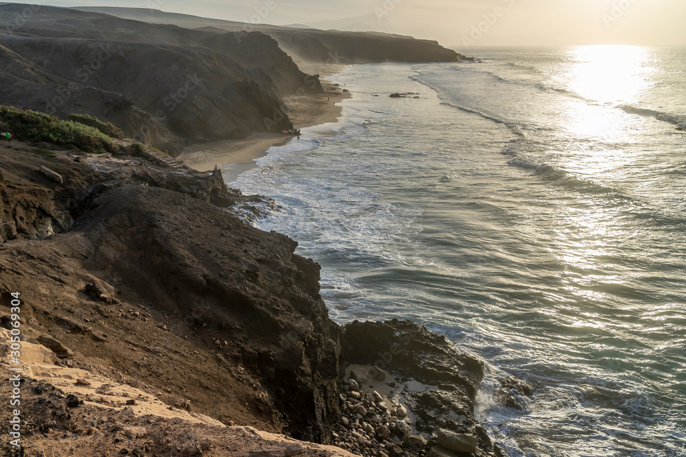 Obraz premium Beautiful sunset on the coast of Playa La Pared in Fuerteventura, Canary Islands, Spain