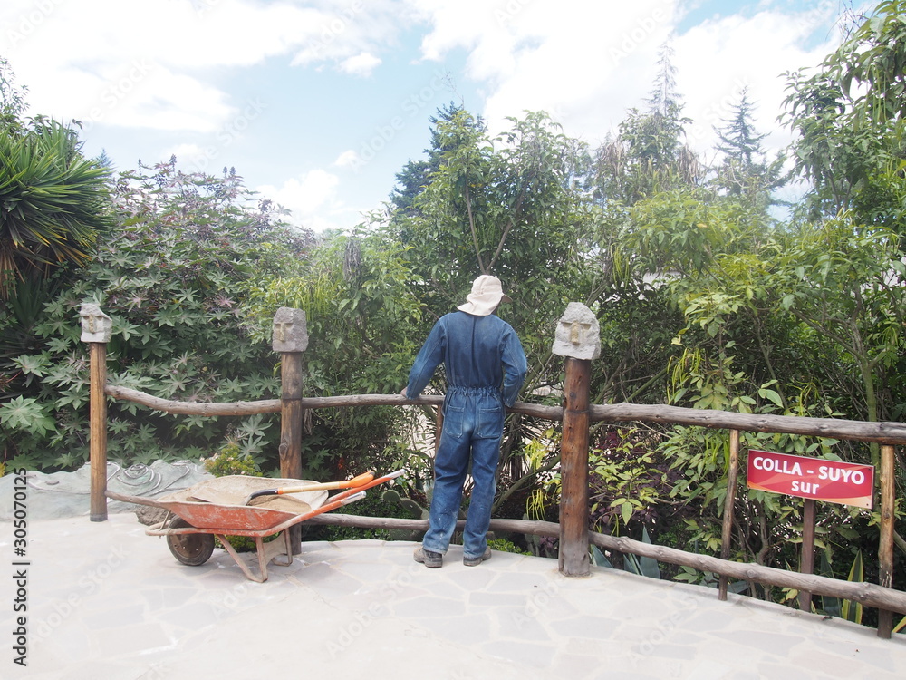 A worker gazing at the beautiful greenery, Mitad del Mundo, Quito, Ecuador