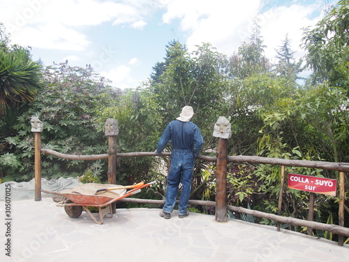 A worker gazing at the beautiful greenery, Mitad del Mundo, Quito, Ecuador