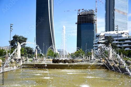 Fountain of The Four Seasons at Julius Caesar Square with the Three Towers photo