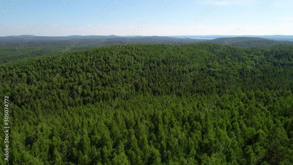 Rock formation in the forest. Ural mountains. Rock formation in the forest. Ural mountains.