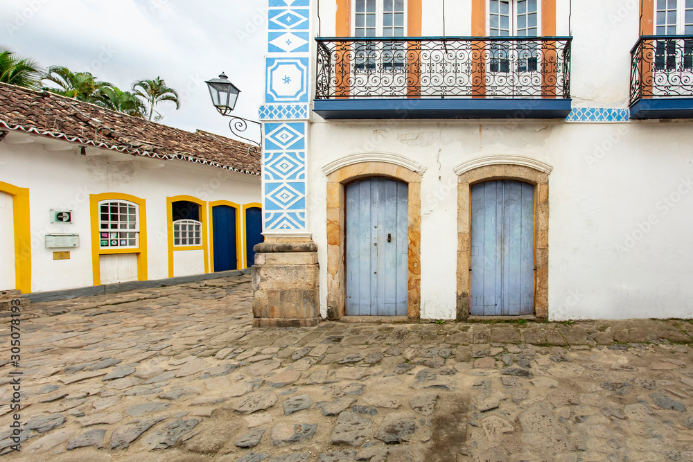 Stones street with reflection in the historical center of Paraty. World Heritage of Humanity, Rio de Janeiro, Brazil, Portuguese colonial and Brazilian imperial city where the sea invades at full tide
