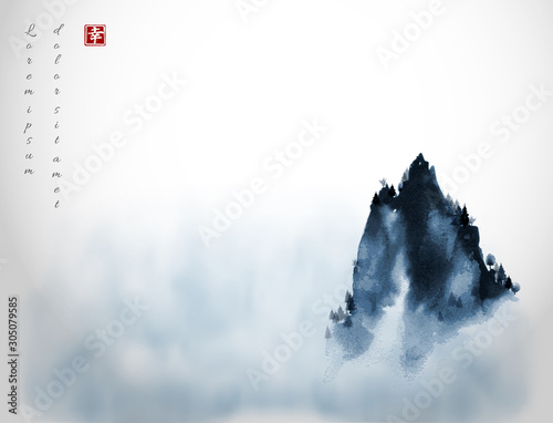 High mountain peak in fog. Traditional oriental ink painting sumi-e, u-sin, go-hua. Hieroglyph - happiness.