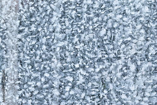 Texture of ice covered snow . Ice surface with original texture
