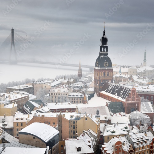 Areal view on Riga cityscape in fog, Latvia