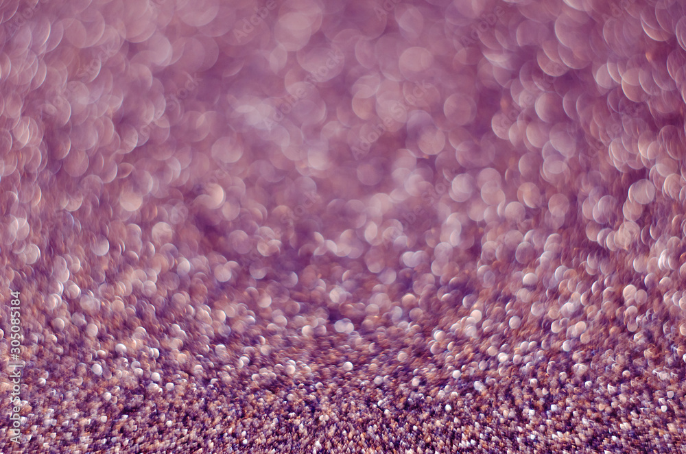 Obraz premium Abstract festive pink bokeh background with shining defocus sparkles. Blurred glitters shimmering dust macro close up, copy space for text logo