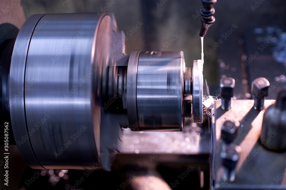 Fototapeta premium Old metal lathe machine, retro machine background.