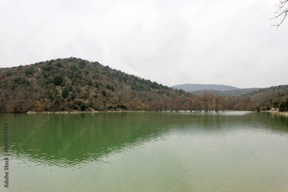 View to lake Sukko in the mountains with green water, Krasnodar krai, Russia View to lake Sukko in the mountains with green water, Krasnodar krai, Russia