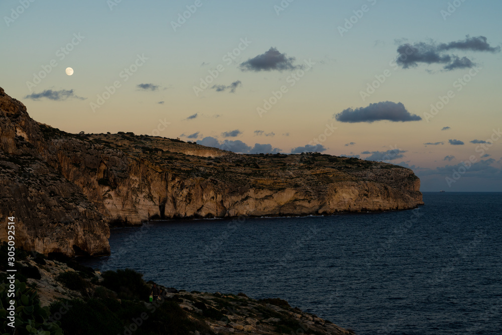 Malta blue grotto at sunset
