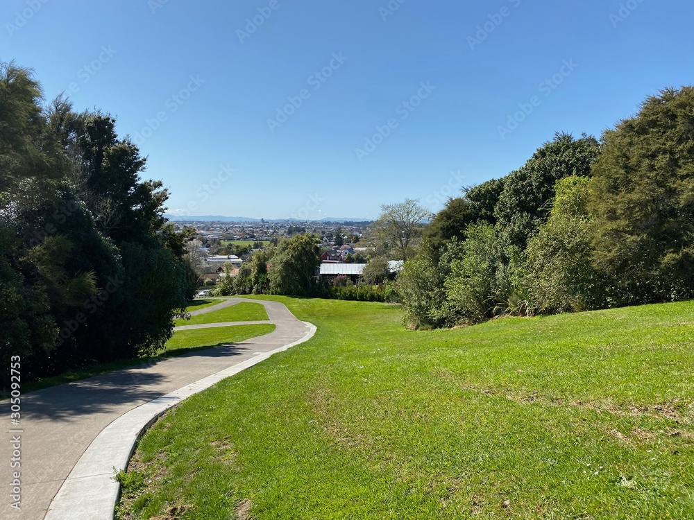 Walking trail between Till's Lookout and Taitua Arboretum in Hamilton, New Zealand Walking trail between Till's Lookout and Taitua Arboretum in Hamilton, New Zealand