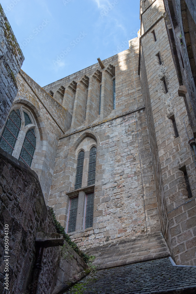 Exterior walls of Abbey of Mont Saint-Michel with stained glass