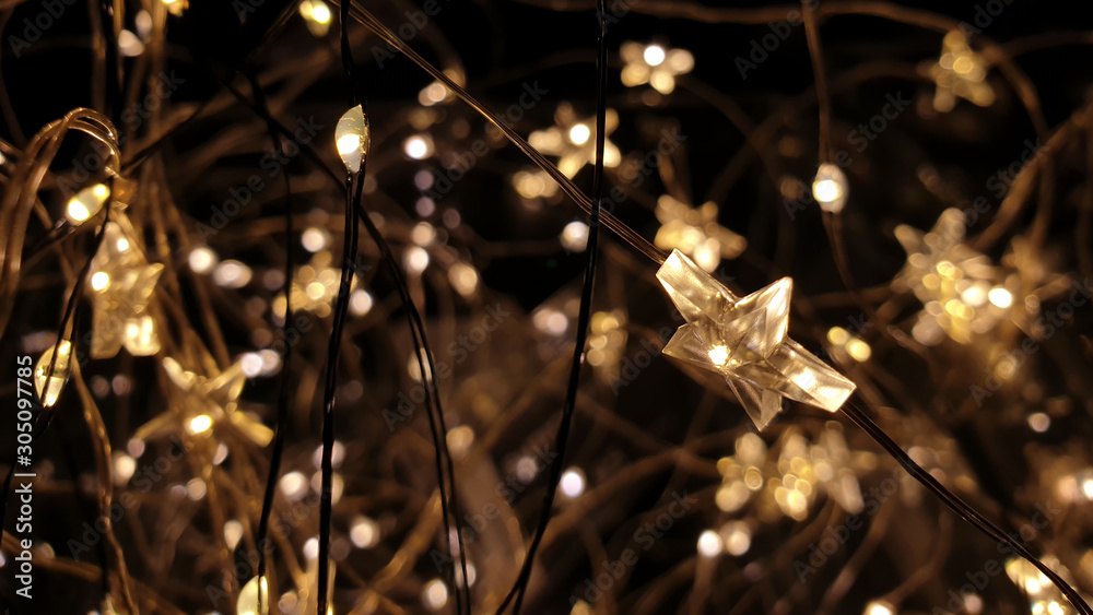 Star Christmas lights, fairy lights, close up on background Stock Photo | Adobe