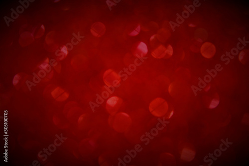 Red bokeh glitter background. Concept for Christmas  New Year  Valentines and All Celebrations.