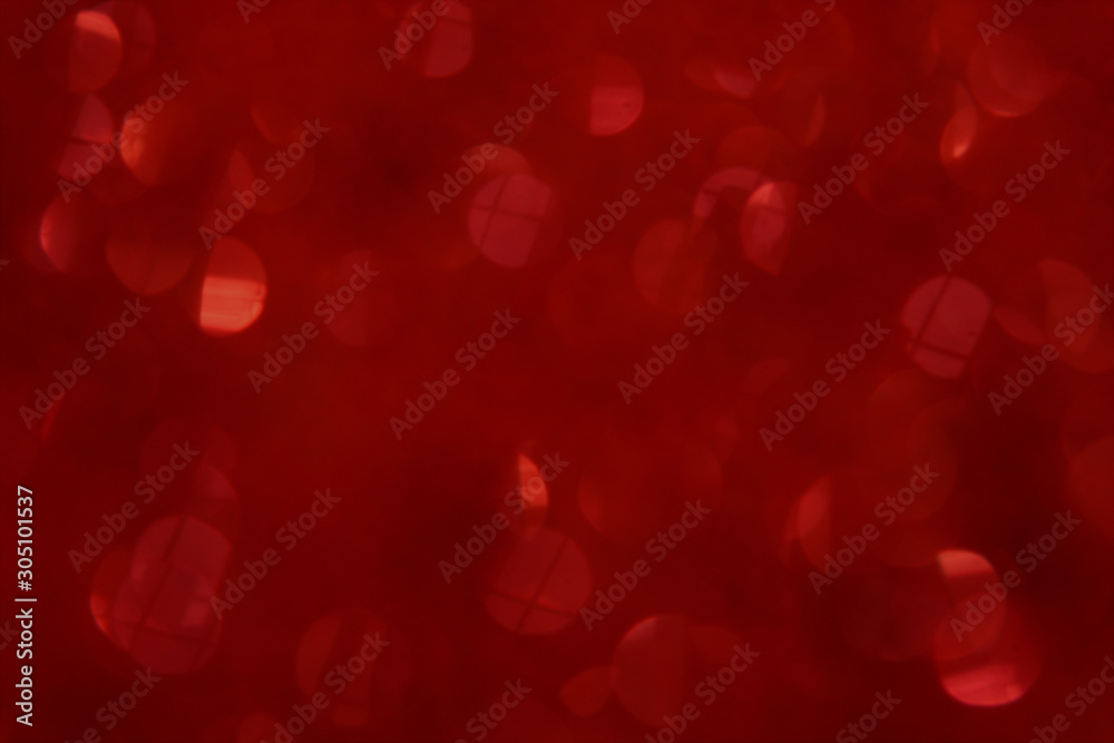 Red bokeh glitter background. Concept for Christmas, New Year, Valentines and All Celebrations.