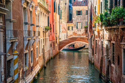 Traditional canal street in Venice, Italy © perekotypole
