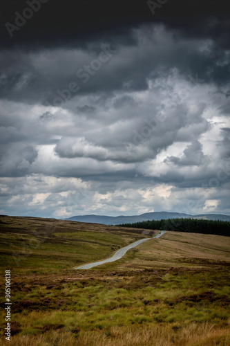 Road to nowhere. Beautiful landscape from Wales with a dramatic clouds.