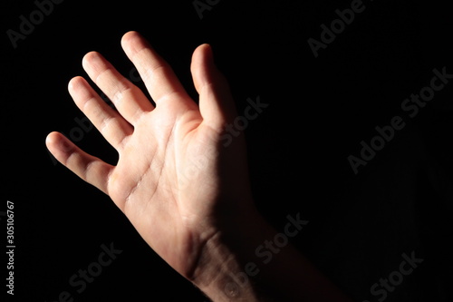 Men's palm in full dark under studio lighting, or "Helping Hand" © Олександр Рудий