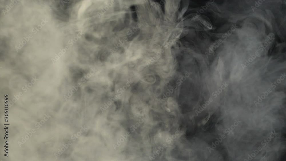 Realistic Smoke Clouds Fog flies through the frame. Good footage for effects and transitions. Smoke cloud on black isolated background Realistic Smoke Clouds Fog flies through the frame. Good footage for effects and transitions. Smoke cloud on black isolated background
