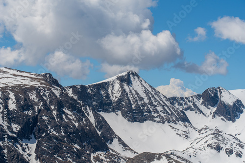 Low angle landscape of mountain tops in winter in Rocky Mountain National Park in Colorado © Angela