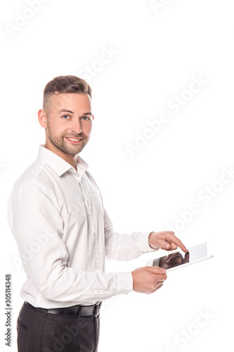 smiling businessman using digital tablet isolated on white