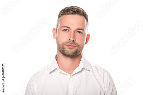 handsome young businessman in shirt isolated on white with copy space © Igor