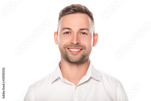 portrait of smiling confident businessman in white shirt isolated on white