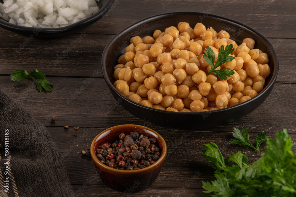 Chickpeas in a bowl on kitchen countertop Chickpeas in a bowl on kitchen countertop